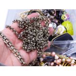A VINTAGE ACCESSOCRAFT N.Y.C, HEAVY LONG VINTAGE COSTUME CHAIN, TOGETHER WITH A SILVER CHARM AND A