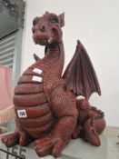 A BROWN WINGED DRAGON FIGURE