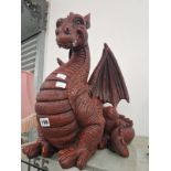 A BROWN WINGED DRAGON FIGURE