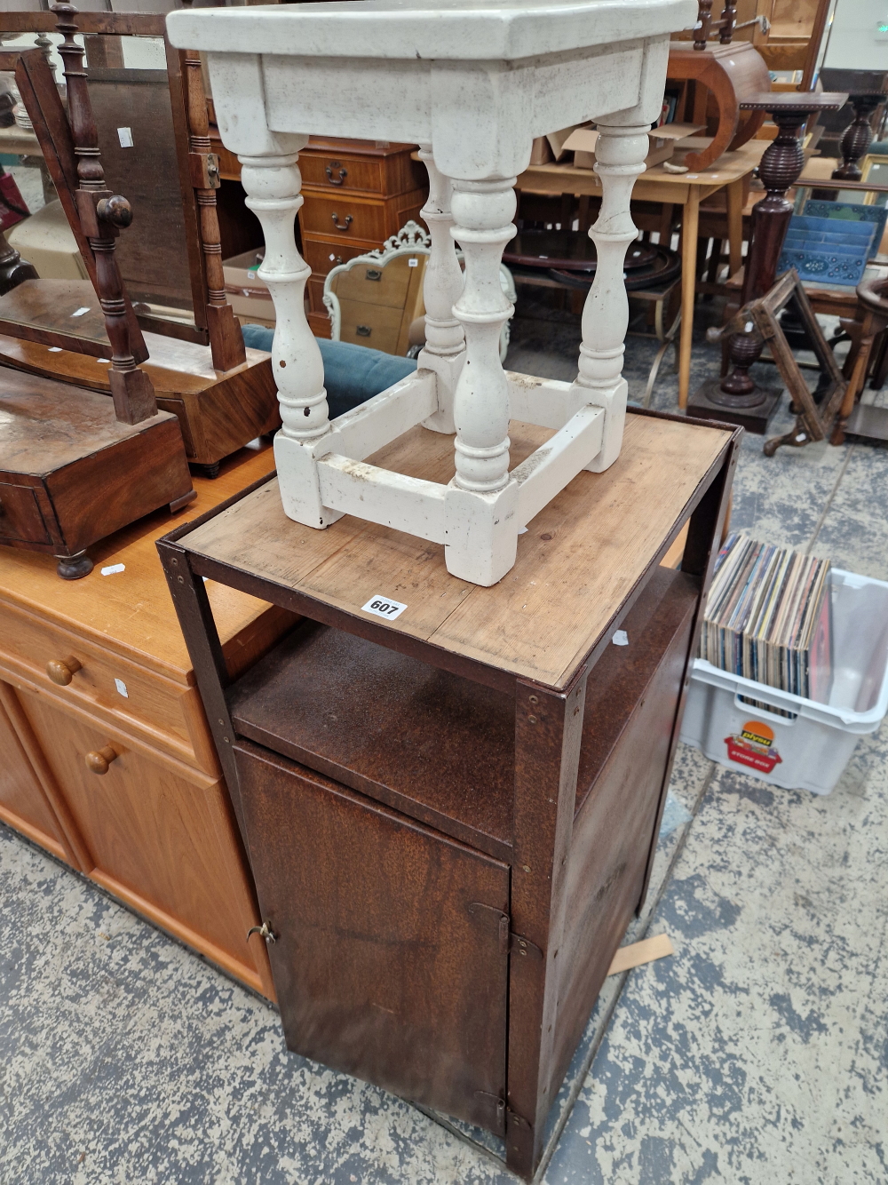 A METAL BEDSIDE CABINET