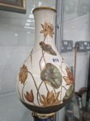 AN AESTHETIC PERIOD WEDGWOOD BOTTLE VASE PAINTED WITH WATER LILIES