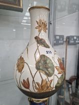 AN AESTHETIC PERIOD WEDGWOOD BOTTLE VASE PAINTED WITH WATER LILIES