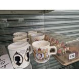 A CORONATION COACH GROUP TOGETHER ROYAL SOUVENIR MUGS