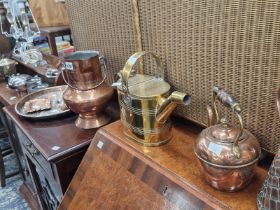 A PAIR OF TABLE LAMPS, AN ELECTROPLATE TEA AND A COFFEE POT, 2 COPPER JUGS, A BRASS HOT WATER CAN, 2