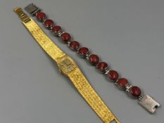 A LADIES REGENCY BRICK STYLE BRACELET MANUAL WOULD WATCH, TOGETHER WITH A UNHALLMARKED SILVER AND