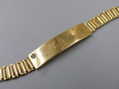 A 9ct GOLD HALLMARKED GATE LINK ID BRACELET, ENGRAVED MARGARET, WITH DIAMOND SET BAR, THE CLASP WITH
