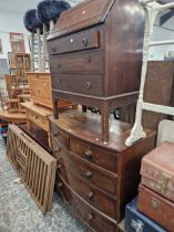A VICTORIAN MAHOGANY BOW FRONT CHEST OF TWO SHORT AND THREE LONG DRAWERS TOGETHER WITH A 20th C.
