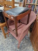 AN INTERESTING ART DECO STYLE DRESSING STOOL TOGETHER WITH A LLOYD LOOM ARMCHAIR.