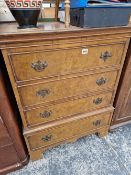 A SMALL WALNUST CHEST OF 4 LONG DRAWERS. H 93cms W 69cms D 44cms