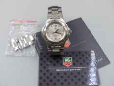 A TAG HEUER PROFESSIONAL STAINLESS STEEL WRIST WATCH, MODEL NUMBER WL111E. WORKING, NO GUARANTEE.