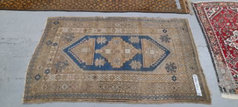 AN ANTIQUE TRIBAL CAUCASIAN RUG 200 x 129cm, TOGETHER WITH TWO OTHER ORIENTAL RUGS 155 x 95 AND