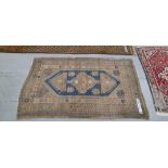 AN ANTIQUE TRIBAL CAUCASIAN RUG 200 x 129cm, TOGETHER WITH TWO OTHER ORIENTAL RUGS 155 x 95 AND