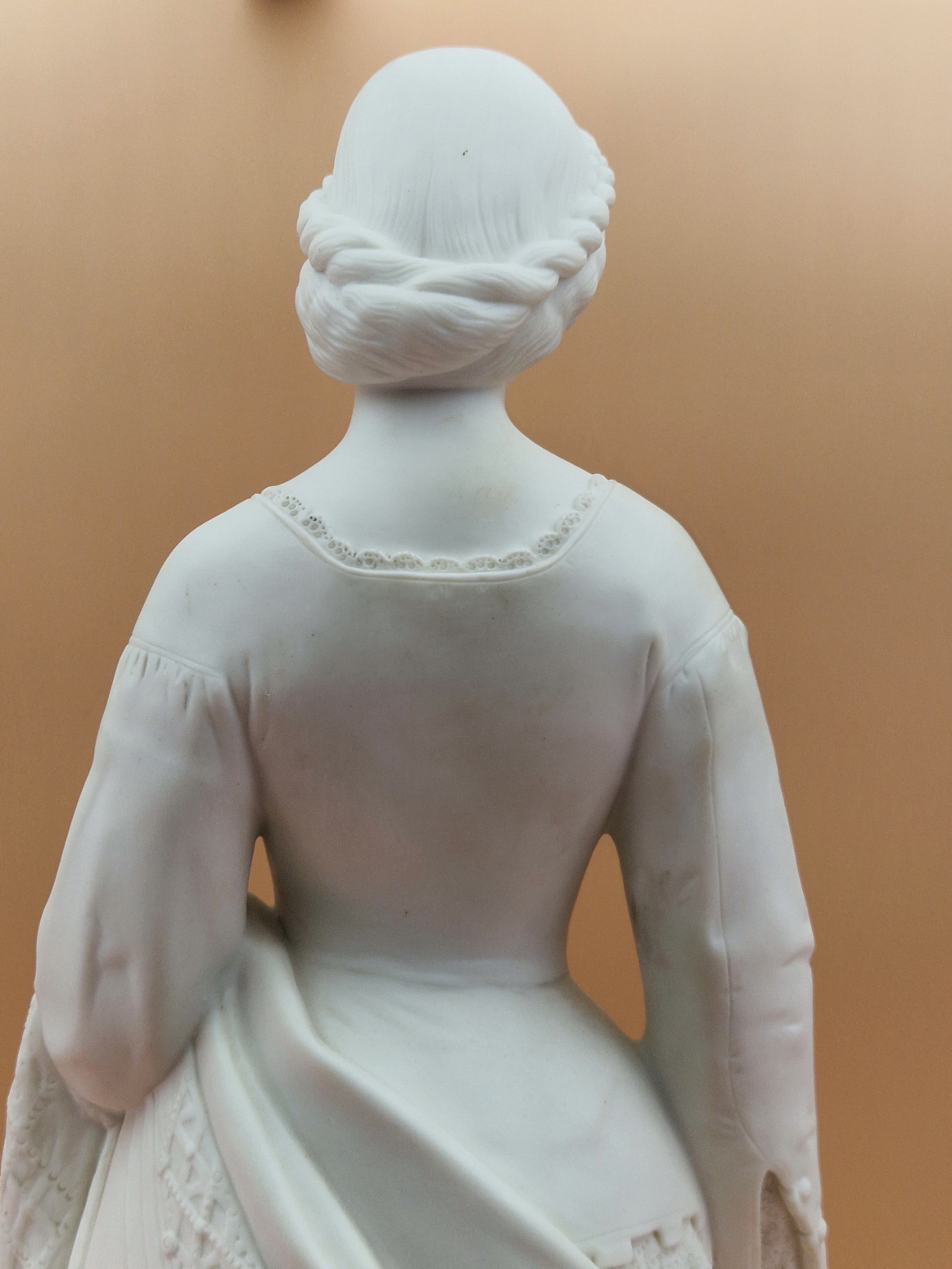A MINTON PARIAN FIGURE OF A VICTORIAN LADY STANDING ON A CIRCULAR CARPET MOULDED BASE HOLDING UP A - Image 9 of 10