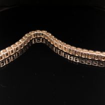 A DIAMOND LINE BRACELET. THE BRACELET WITH FORTY-SIX SLIGHTLY GRADUATED ROUND BRILLIANT CUT DIAMONDS