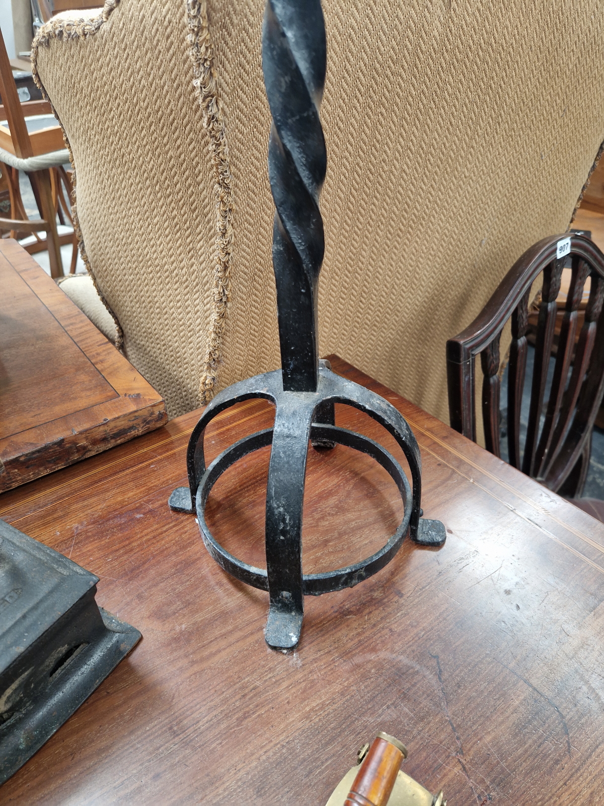 A PAIR OF SPIRALLY WROUGHT IRON FLOOR STANDING CANDLESTICKS, SIX CLOTHES IRONS, A MINERS LAMP AND - Image 6 of 7