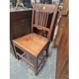 A 19th C. OAK AND A MAHOGANY CHAIR, EACH WITH SOLID SEATS