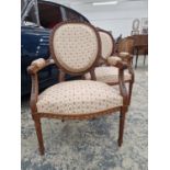 A PAIR OF FRENCH CARVED SHOW FRAME OPEN ARMCHAIRS ON FLUTED LEGS.