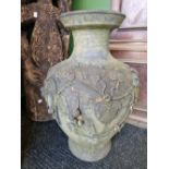 A PAIR OF VINTAGE WEATHERED TERRACOTTA BALUSTER VASES.