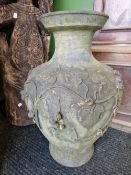 A PAIR OF VINTAGE WEATHERED TERRACOTTA BALUSTER VASES.