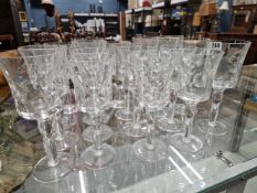 NINETEEN ST LOUIS WINE GLASSES, EACH WITH THE BUCKET BOWL CUT WITH ROUNDELS, THE TWO PART SWOLLEN