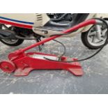 A VINTAGE HAND OPERATED TYRE INFLATION PUMP