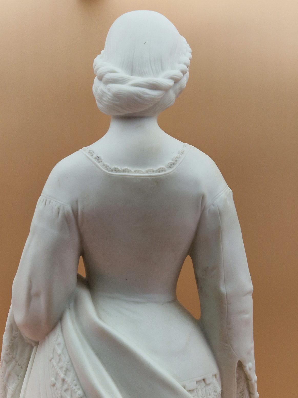 A MINTON PARIAN FIGURE OF A VICTORIAN LADY STANDING ON A CIRCULAR CARPET MOULDED BASE HOLDING UP A - Image 8 of 10