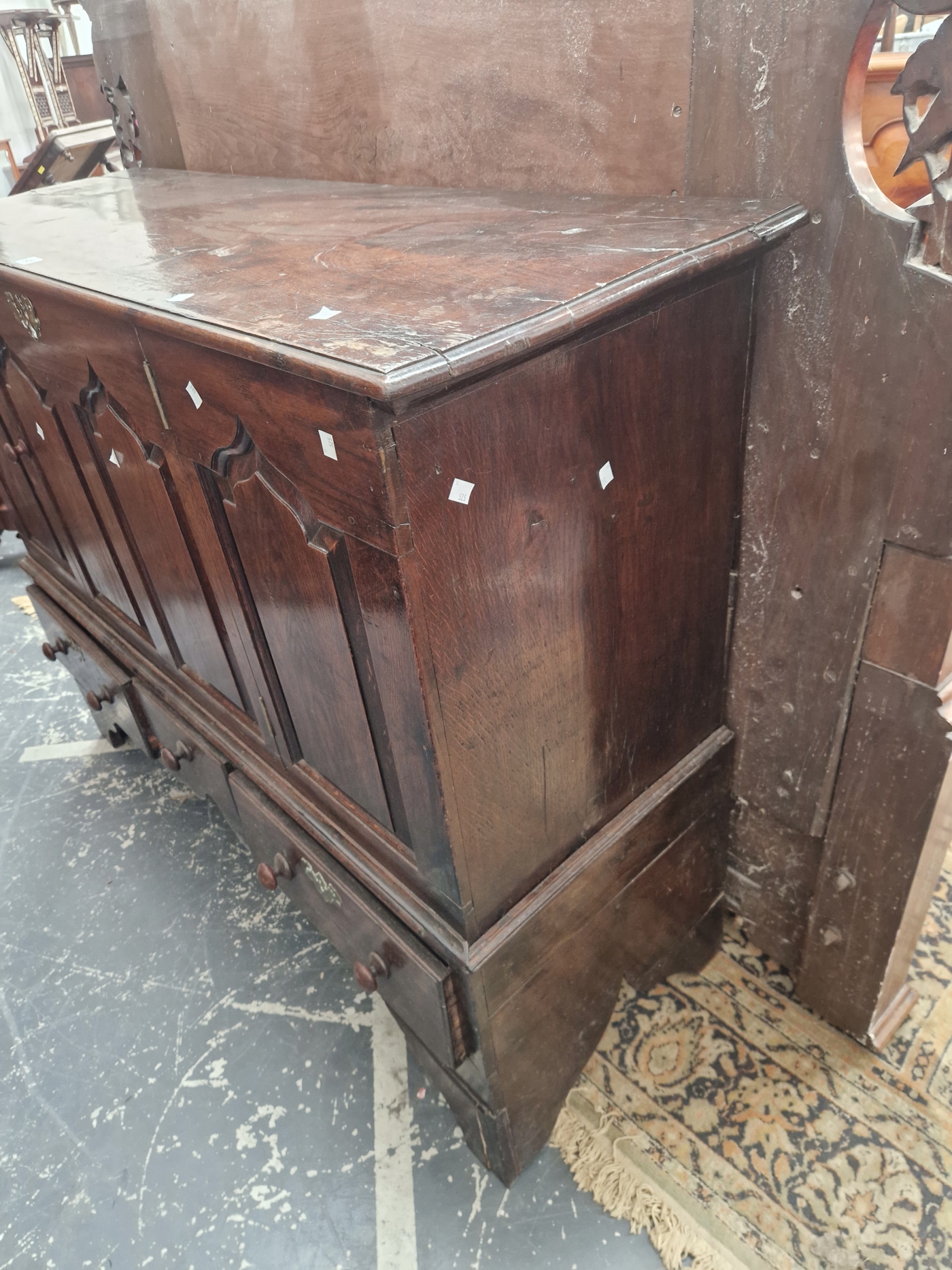 AN 18th C. OAK MULE CHEST WITH A FOUR PANELLED FRONT ABOVE THREE DRAWERS. W 143 x D 50 x H 111cms. - Image 6 of 7