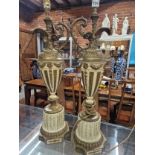 A PAIR OF GILT METAL AND SIMULATED WHITE MARBLE EWER FORM TABLE LAMPS. H 67cms.