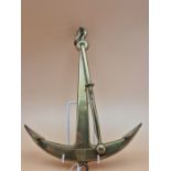 A BRASS MODEL OF A SHIPS ANCHOR. 31cms.