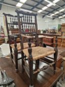 A PAIR OF COUNTRY ELBOW CHAIRS, THE BACKS WITH THREE ROWS OF SPINDLES