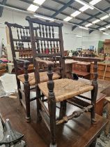 A PAIR OF COUNTRY ELBOW CHAIRS, THE BACKS WITH THREE ROWS OF SPINDLES