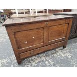 AN 18th C. OAK MULE CHEST WITH THE TWO PANELLED FRONT ABOVE A LONG DRAWER. W 112 x D 49 x H 72cms.