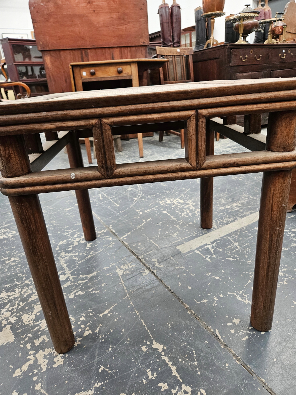 A CHINESE HARDWOOD TABLE, THE CANE INSET TOP ABOVE AN OPEN WORK APRON AND FOUR CYLINDRICAL LEGS.   W - Image 9 of 10