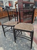A PAIR OF WILLIAM MORRIS STYLE SIDE CHAIRS WITH RUSH SEATS