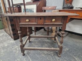 AN 18TH CENTURYMOAK SIDE TABLE WITH FRIEZE DRAWER ON TURNED LEGS WITH STRETCHERS.