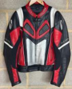 A RICHA LEATHER MOTORCYCLE JACKET RED WHITE AND BLACK.