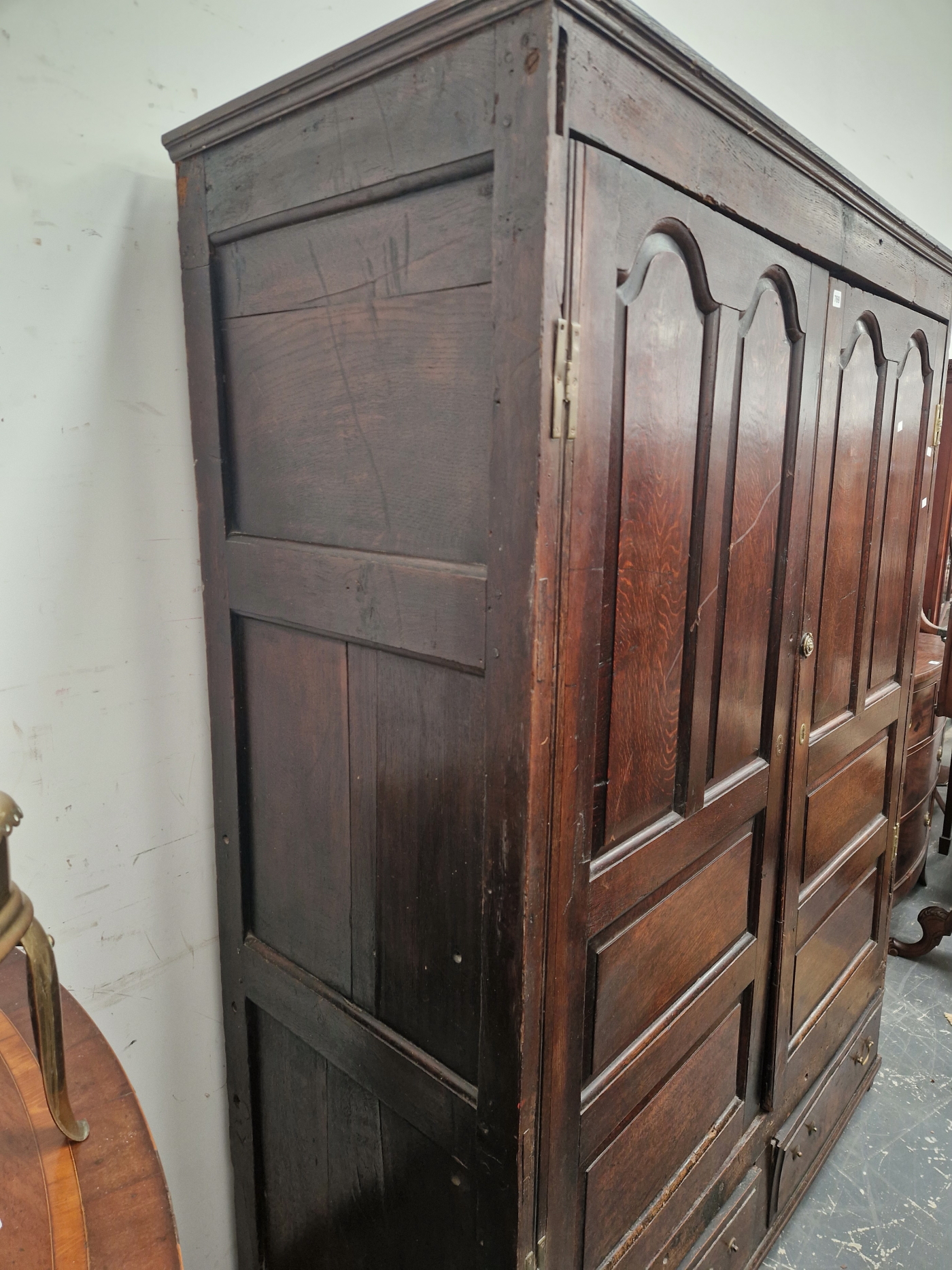 A 18th C. OAK CUPBOARD WITH PANELLED DOORS ENCLOSING HANGING SPACE OVER TWO SHORT DRAWERS. W 141 x D - Image 2 of 5