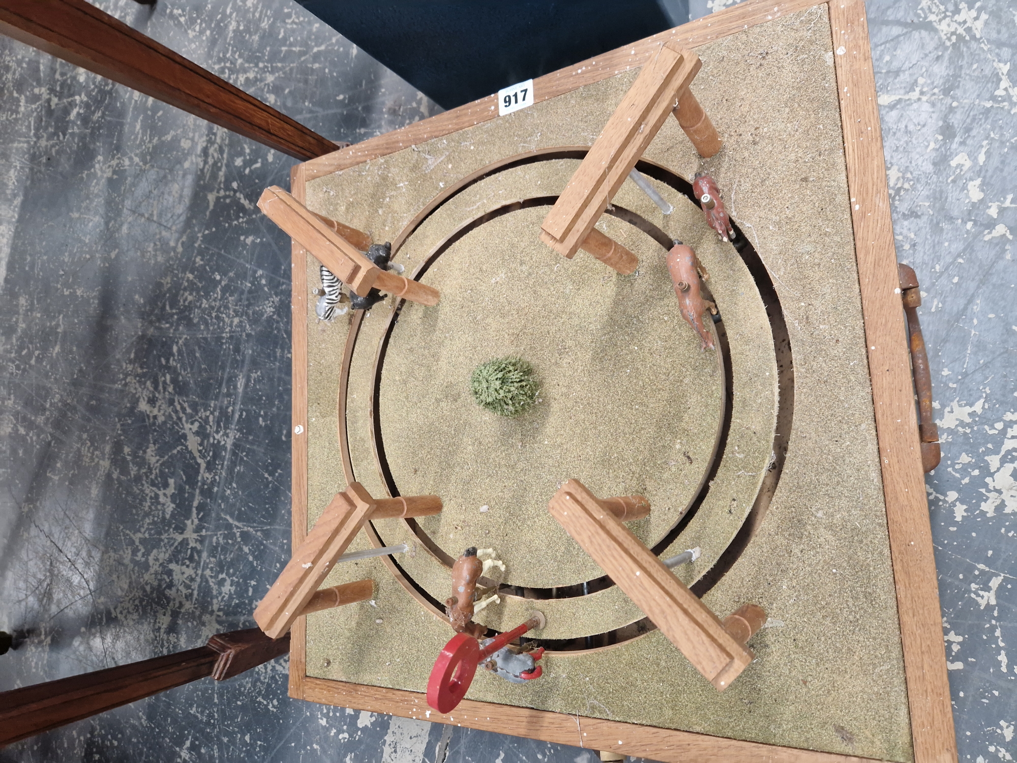 A CRANK HANDLE HORSE RACING GAME, THE FIVE HORSES RACING THROUGH WOODEN ARCHES ON A CIRCULAR TRACK - Image 4 of 4