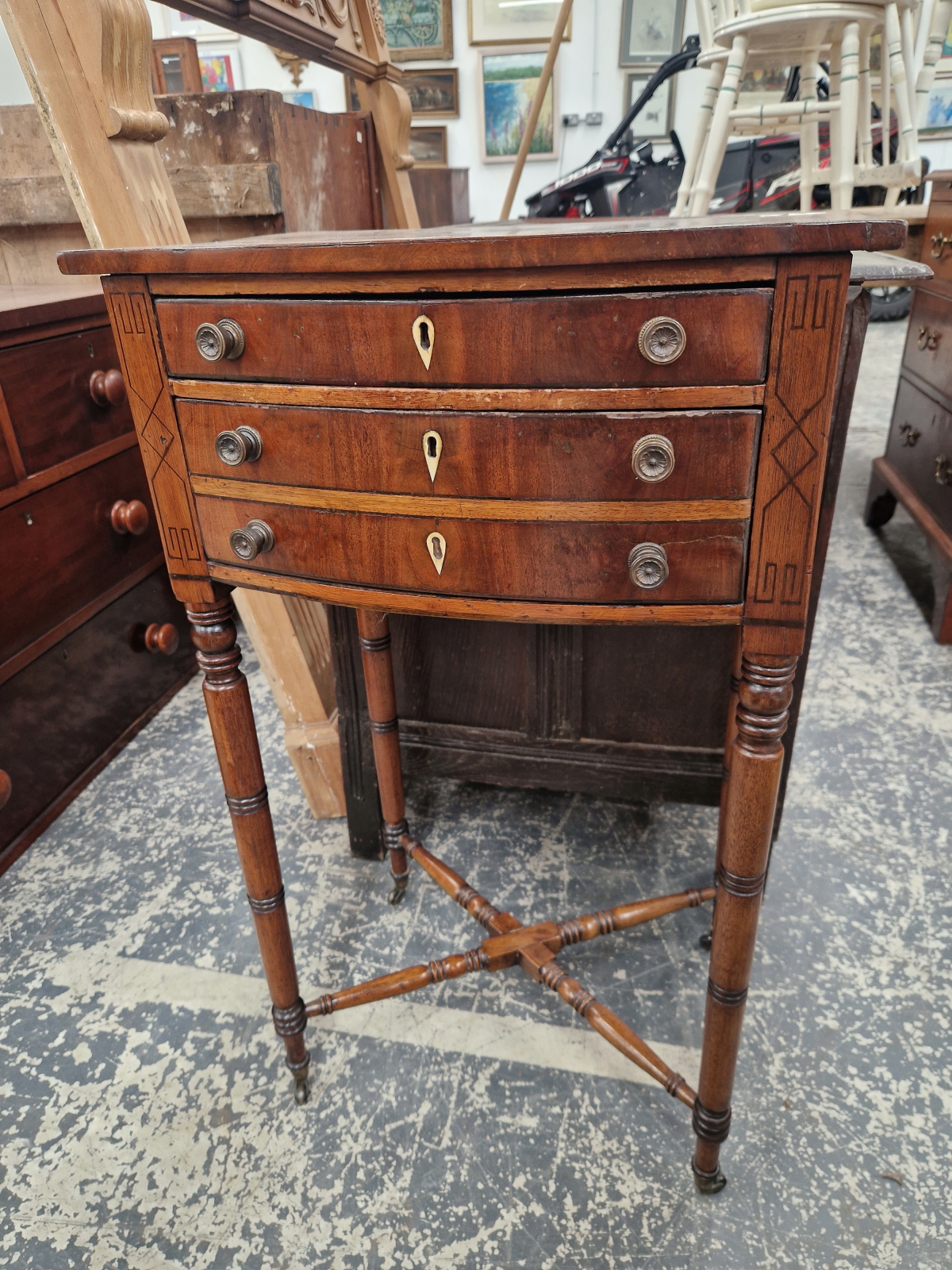 A 19th C. CROSS BANDED AND EBONY LINE INLAID MAHOGANY BOW FRONT SIDE TABLE WITH TWO DRAWERS ABOVE