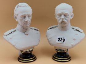 TWO BERLIN BISCUIT PORCELAIN BUSTS OF BISMARCK AND VON MOLTKE, BOTH ON GILT BLUE SOCLES. H 19cms.