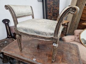 AN EARLY 19th C. SILVERED WOOD WINDOW SEAT, THE UPHOLSTERED ARMS AND SEAT ABOVE FLUTED SQUARE LEGS