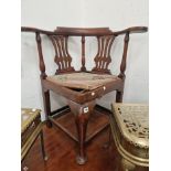A 19th C. OAK DESK CORNER CHAIR WITH A NEEDLE WORK DROP IN SEAT ABOVE A CABRIOLE FRONT LEG ON PAD