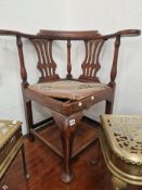 A 19th C. OAK DESK CORNER CHAIR WITH A NEEDLE WORK DROP IN SEAT ABOVE A CABRIOLE FRONT LEG ON PAD