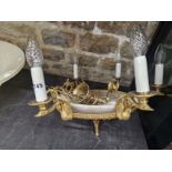 A EMPIRE STYLE SIX LIGHT CHANDELIER, EACH CANDLE SOCKET SUPPORTED ON A SWANS HEAD AND ENCIRCLING