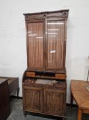 A REGENCY MAHOGANY SLATTED ROLL TOP BUREAU DISPLAY CABINET, THE UPPER HALF WITH GLAZED DOORS LINED