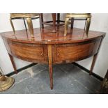 AN ANTIQUE SATIN WOOD BANDED MAHOGANY CORNER FITTING SIDEBOARD WITH TWO DOORS TO THE BOW FRONT ABOVE