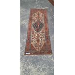 AN ANTIQUE PERSIAN HAMADAN RUNNER 285 x 103 cm.