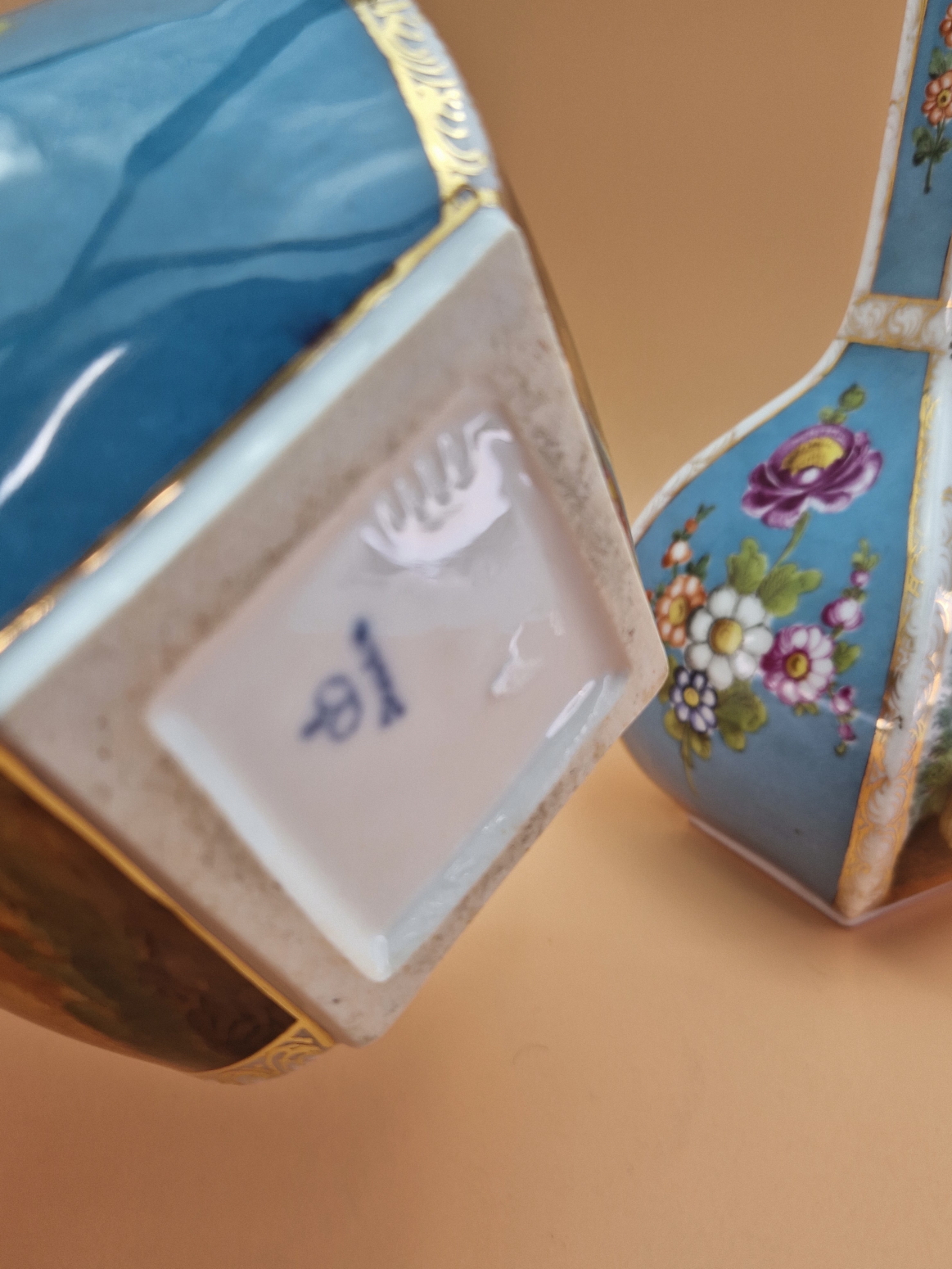 A PAIR OF CROWN DRESDEN SQUARE SECTIONED BOTTLE VASES PAINTED WITH BLUE GROUND FLORAL PANELS - Image 5 of 5