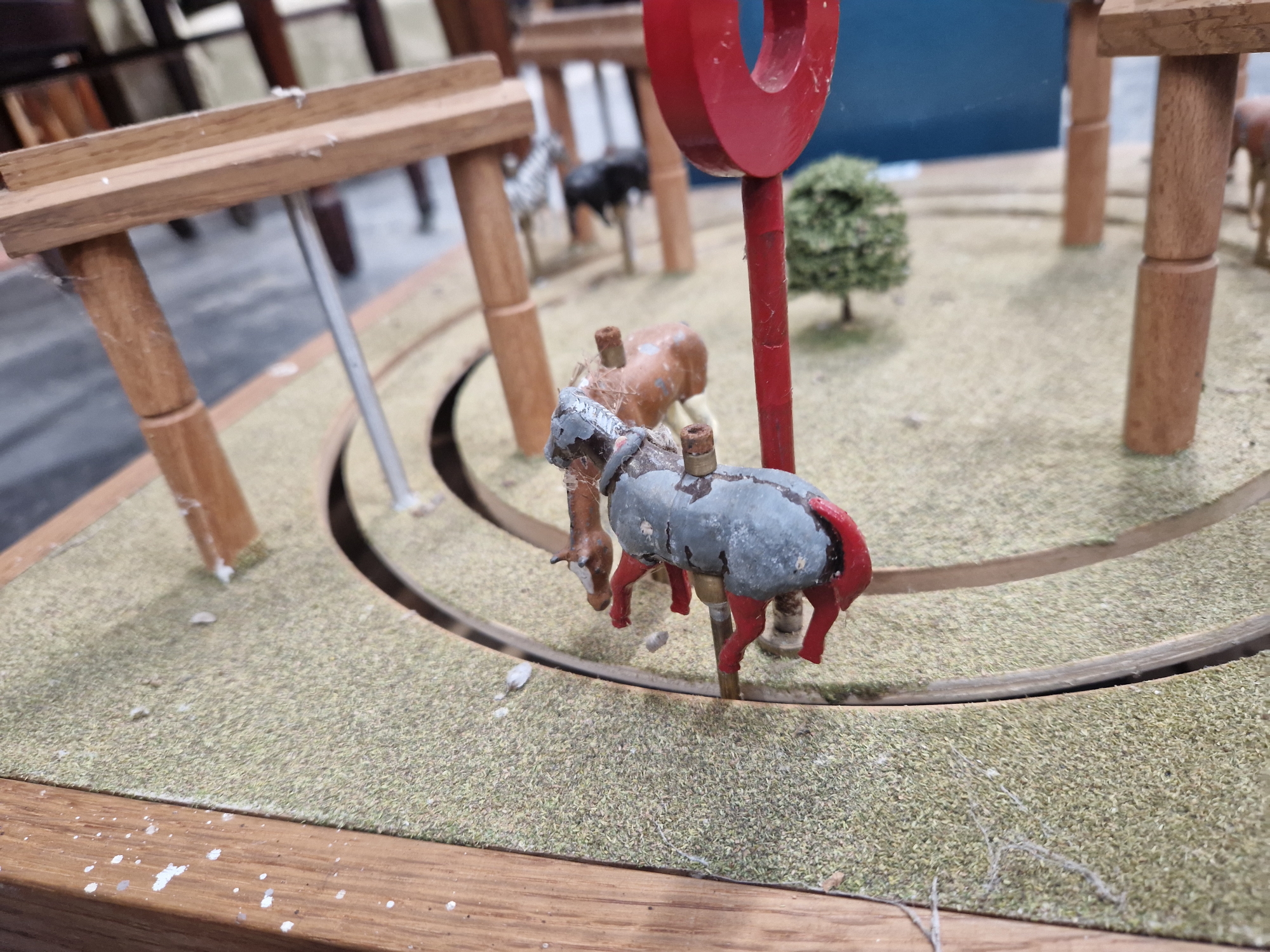 A CRANK HANDLE HORSE RACING GAME, THE FIVE HORSES RACING THROUGH WOODEN ARCHES ON A CIRCULAR TRACK - Image 3 of 4