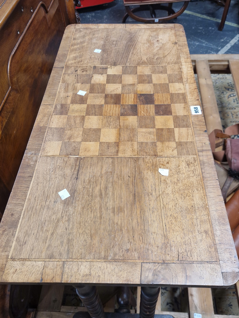 A VICTORIAN MAHOGANY TABLE WITH THE RECTANGULAR TOP INLAID WITH A CENTRAL CHESS BOARD, THE NARROW - Image 2 of 3